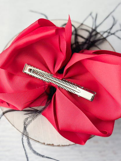 Back of 6 inch two-tone feather puff hair bow showing alligator clip