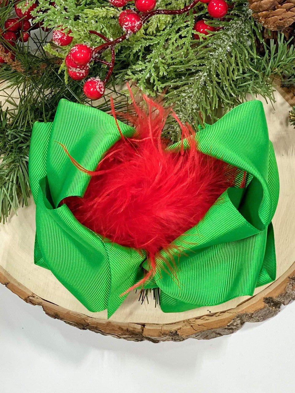 6 inch kelly green grosgrain hair bow with red feather puff