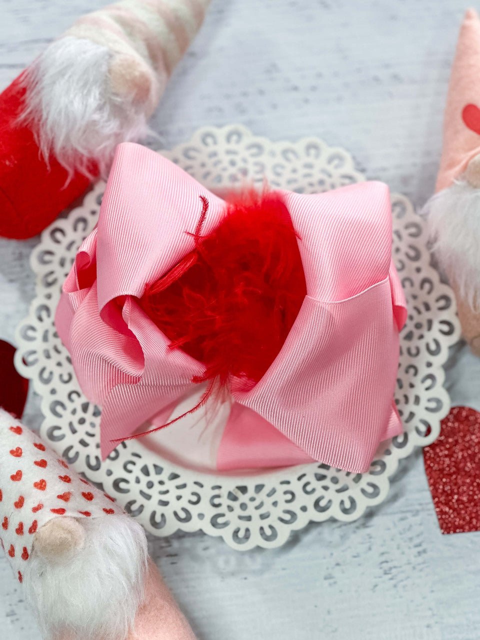 6 inch pink grosgrain hair bow with red feather puff