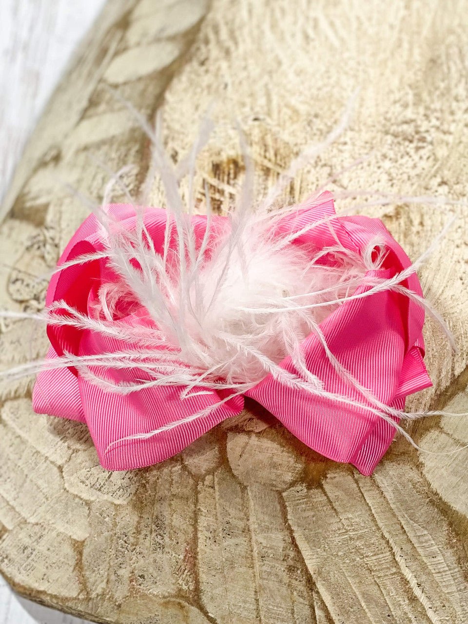 6 inch pink grosgrain hair bow with white feather puff