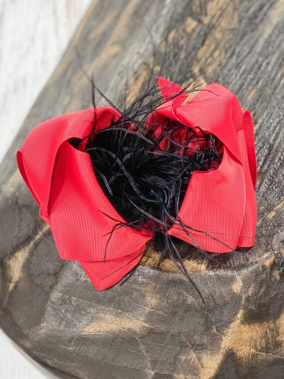 6 inch red grosgrain hair bow with black feather puff