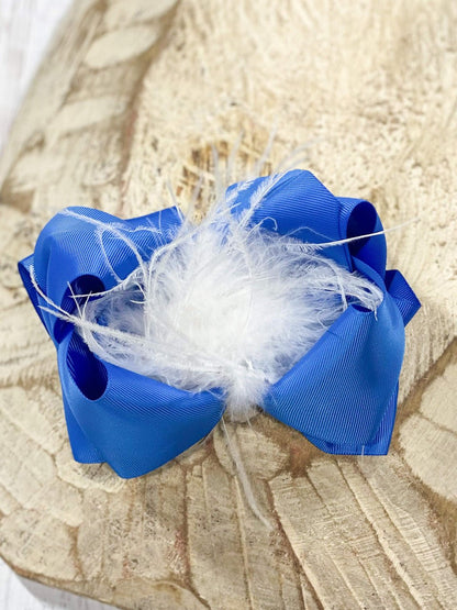 6 inch royal blue grosgrain hair bow with white feather puff
