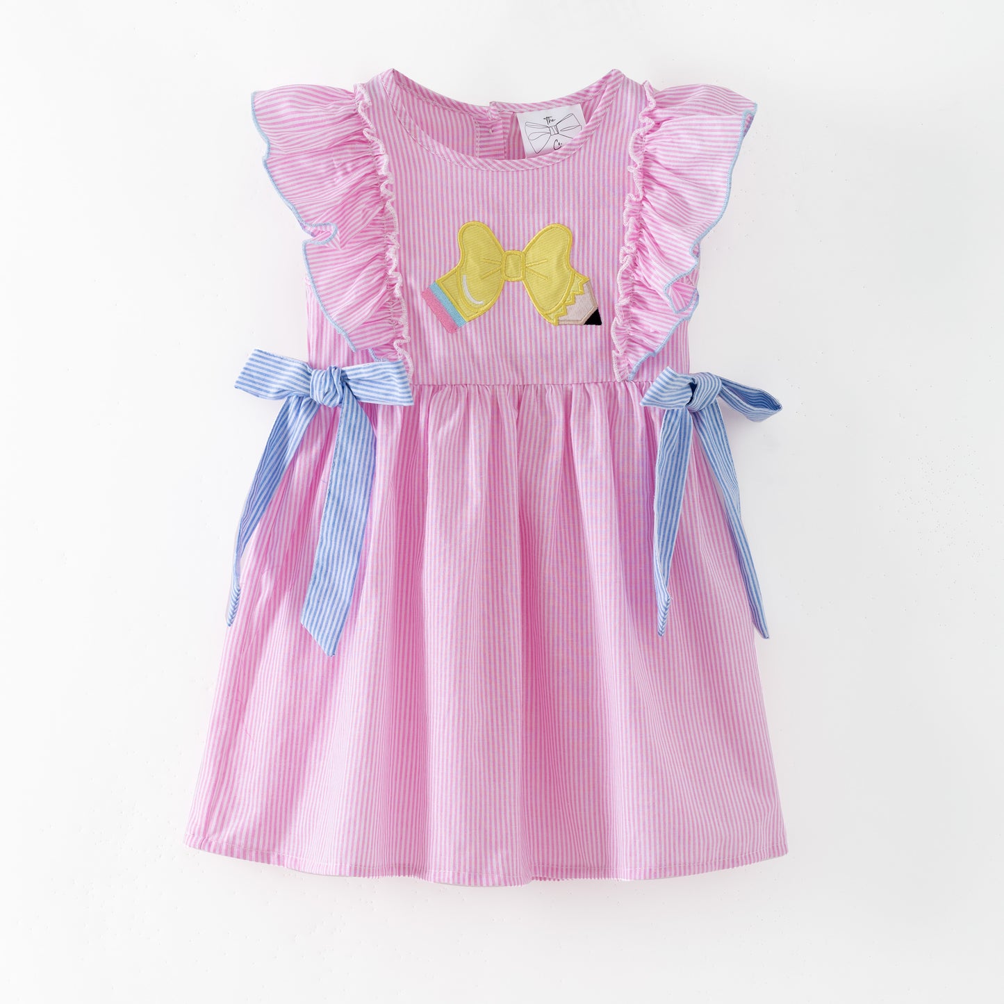 Pink striped dress with a bow on a white background