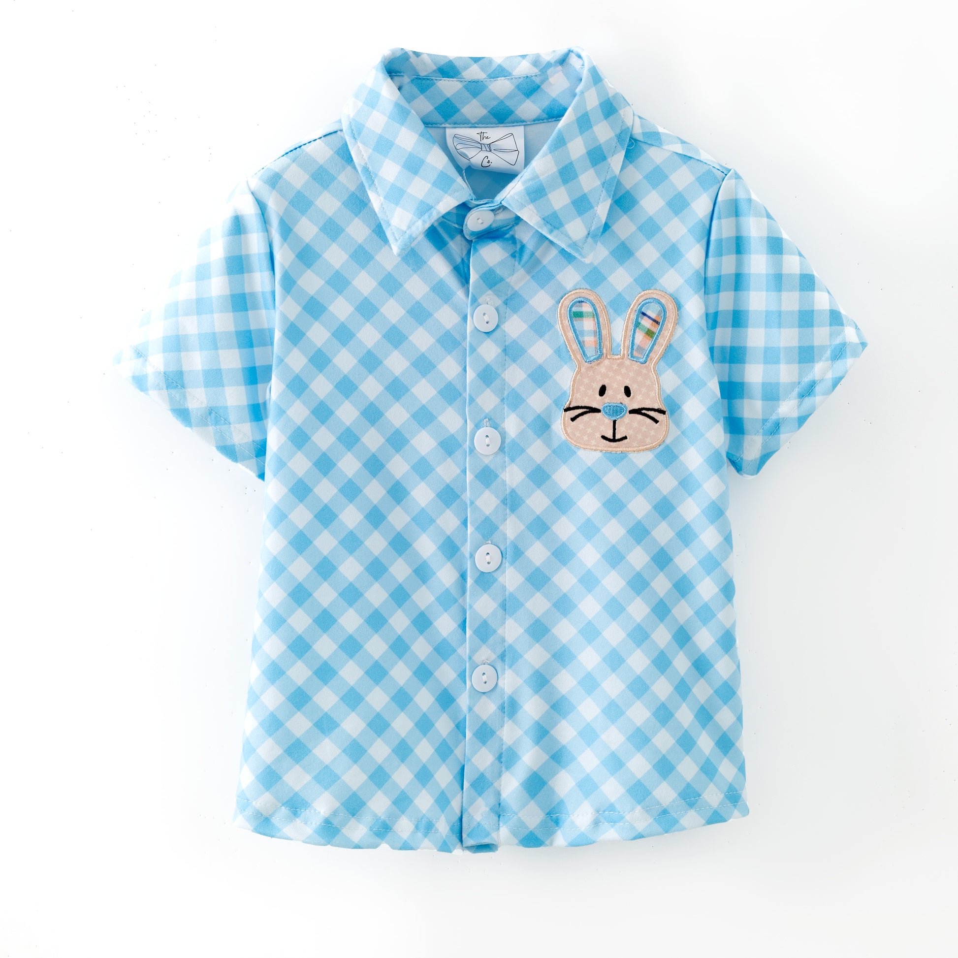 Blue and white checkered shirt with a bunny design on a white background