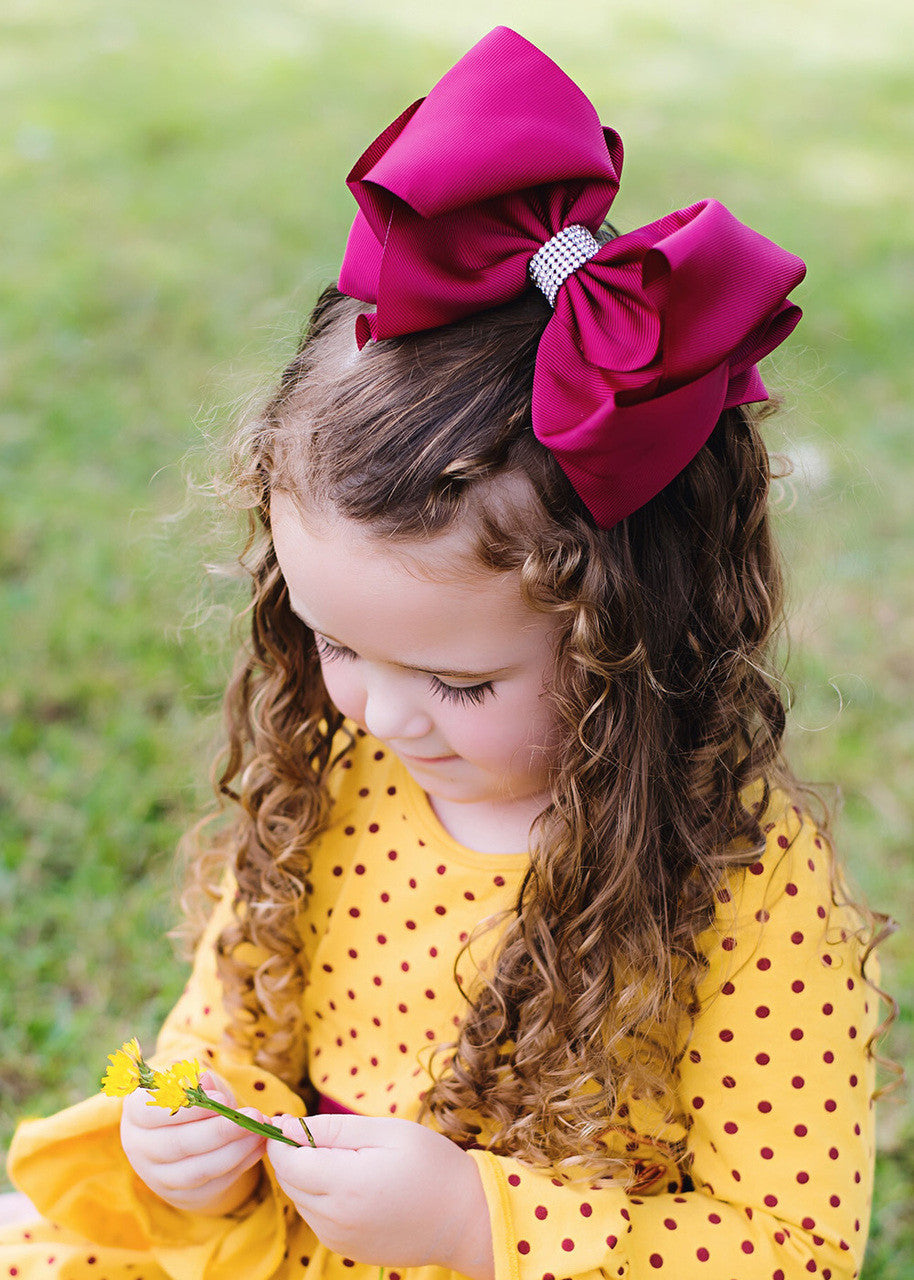 Over sized Rhinestone centered fancy hair bows for girls.