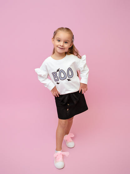 Outfit shown on model.