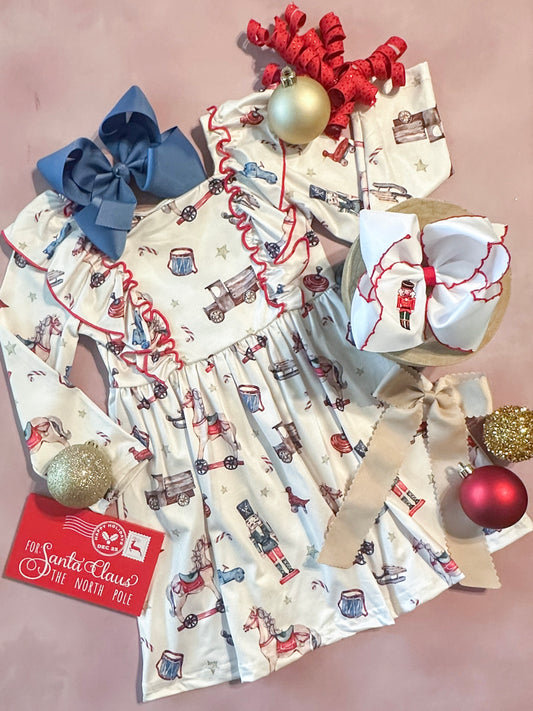 Girls boutique Christmas dress with ruffles and toys print