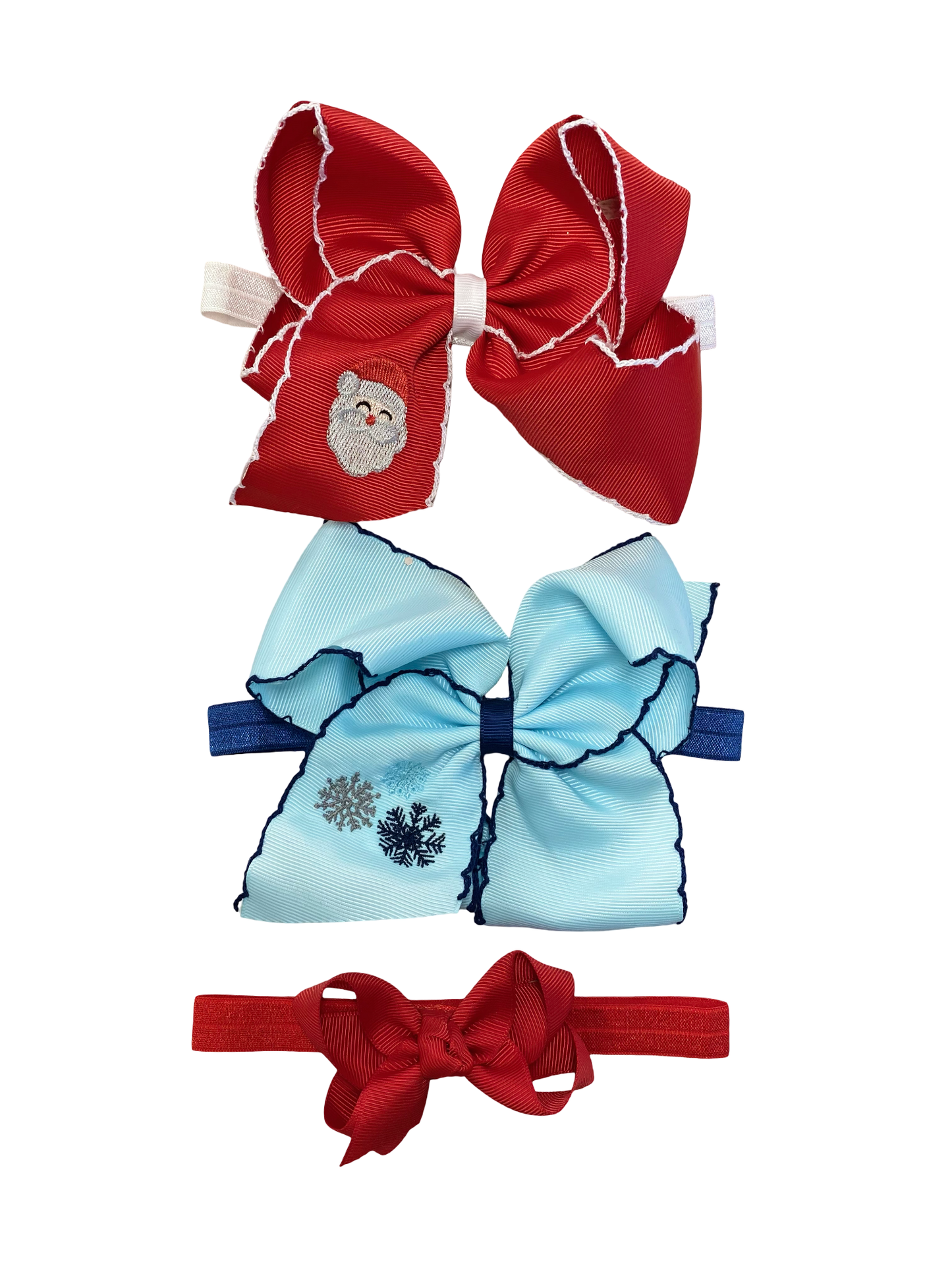 Set of three decorative bows in red, blue, and red on a white background