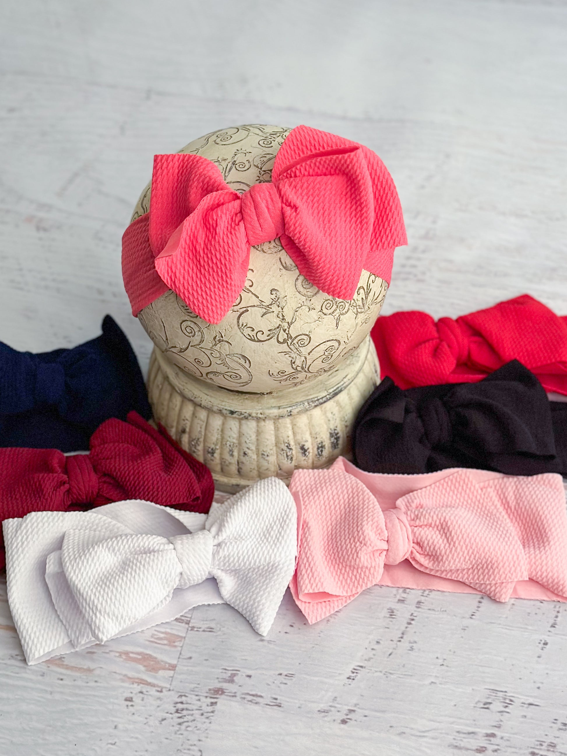 assortment of double bow headbands in multiple colors