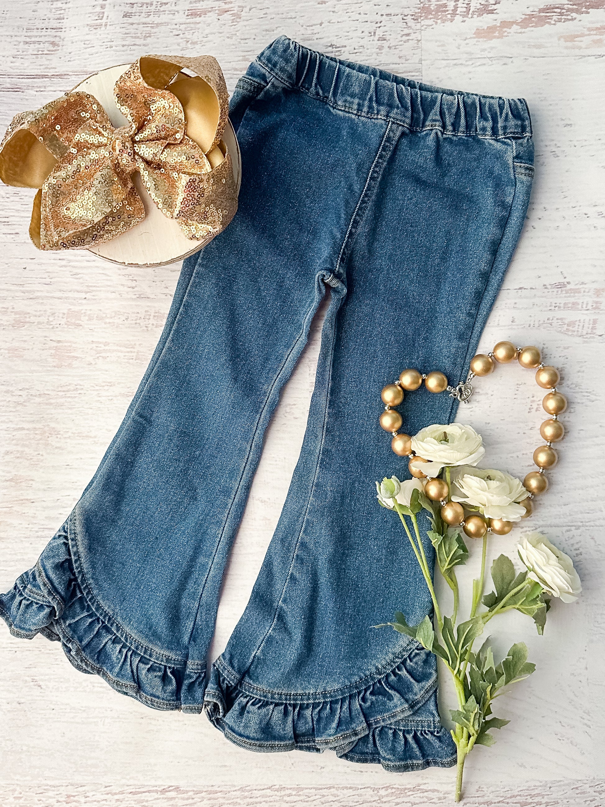 Denim jeans with ruffle hems