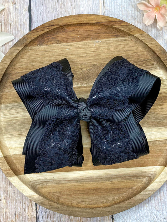 Black Chantilly Lace Classic Hair Bow on wood