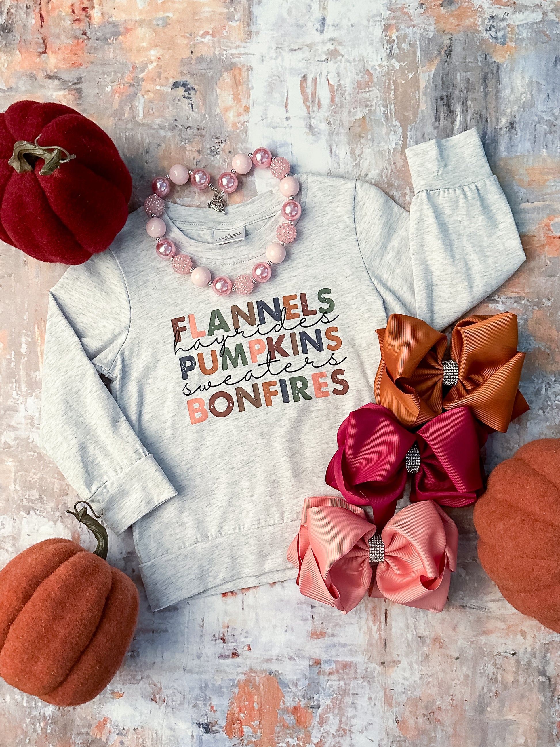 child sized long sleeve "flannels, hayrides, pumpkins, sweaters, bonfires"