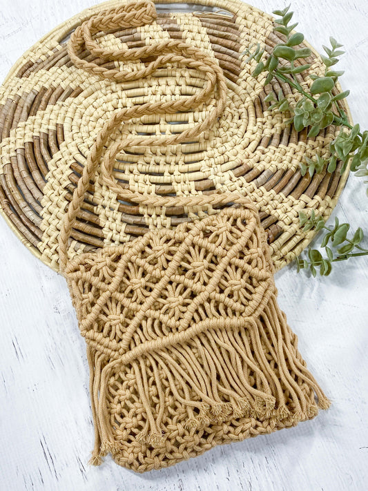 Oatmeal macrame fringe purse with shoulder carrying strap