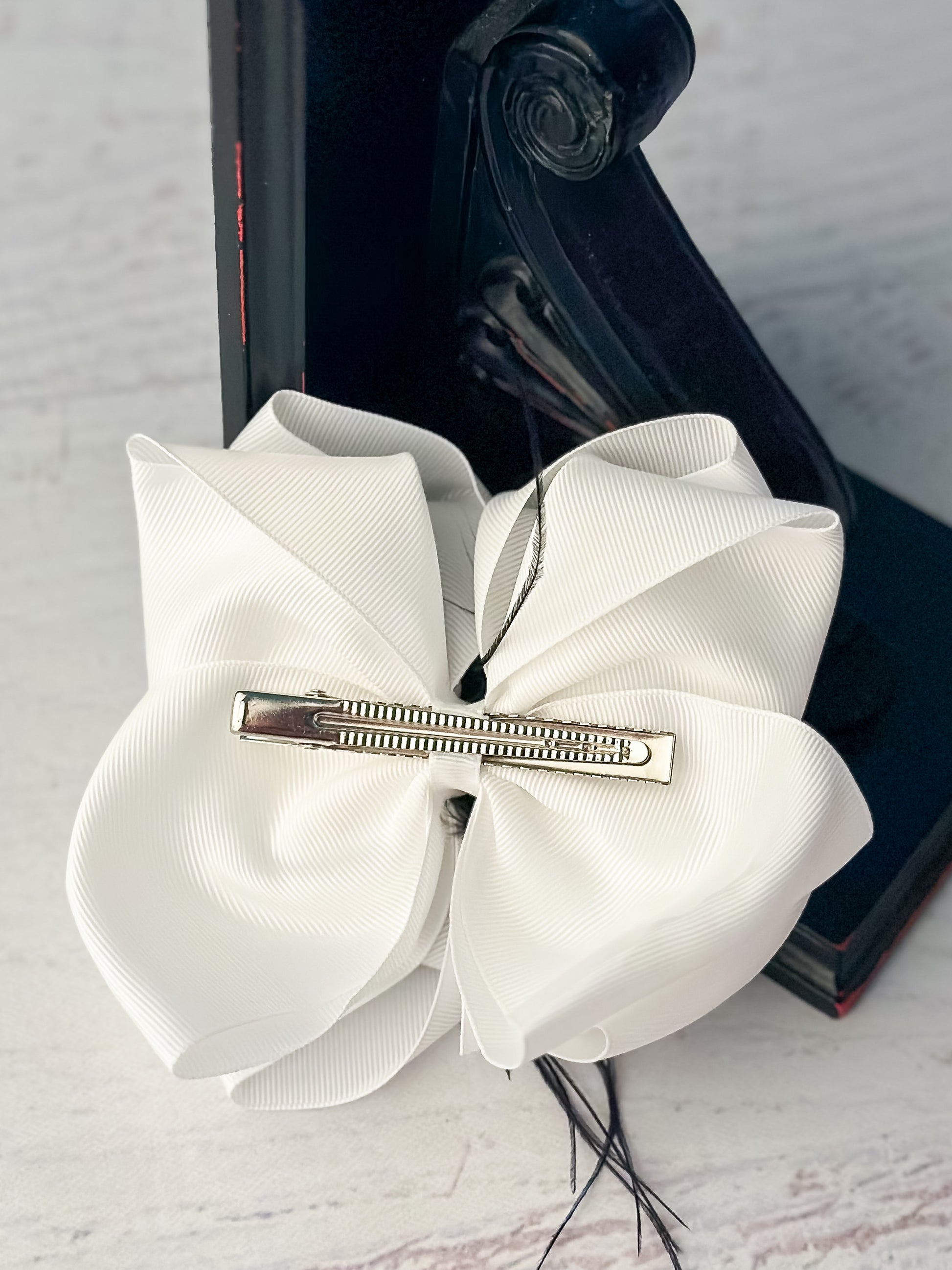 Texas Size White & Black Feather Puff Hair Bow back