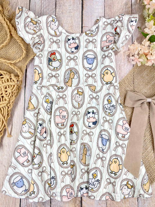 Boutique Girls Farm Animal Dress on a wooden background - Alternative view