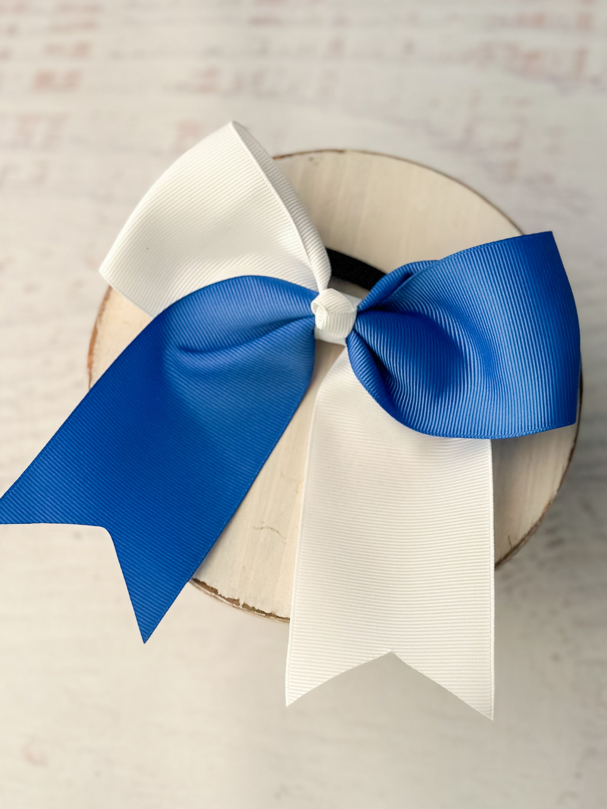 blue and white school spirit cheer bow