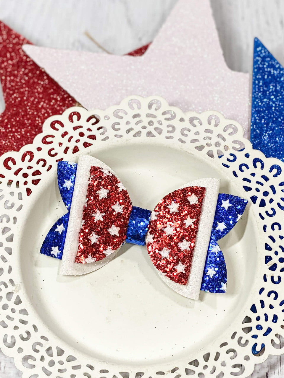 Red, White, & Blue glittery star bow clippie.