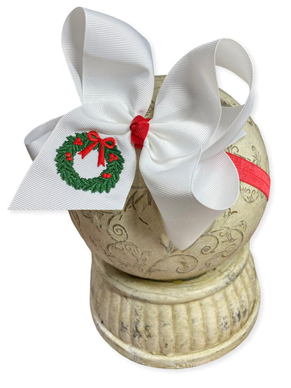 Wreath Embroidered Headband on a head mannequin