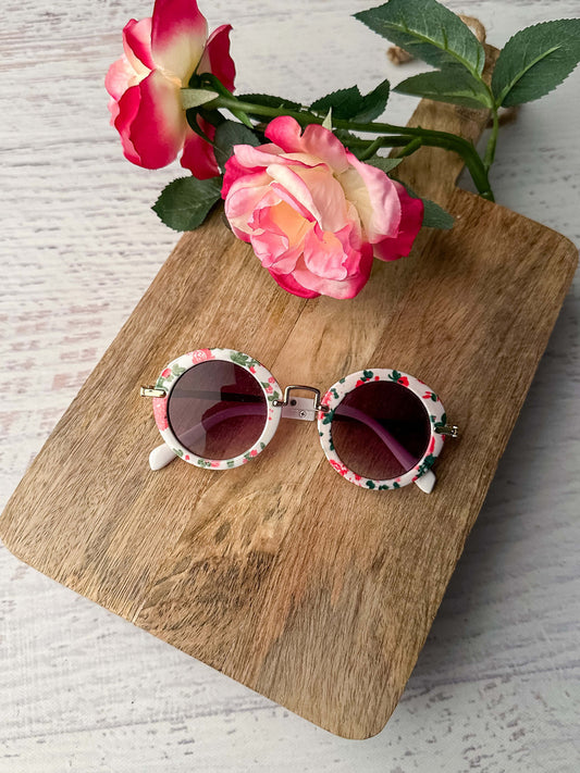 Cute fashion floral print sunglasses for girls and toddler girls. One size, fits up to approximately 7 years.