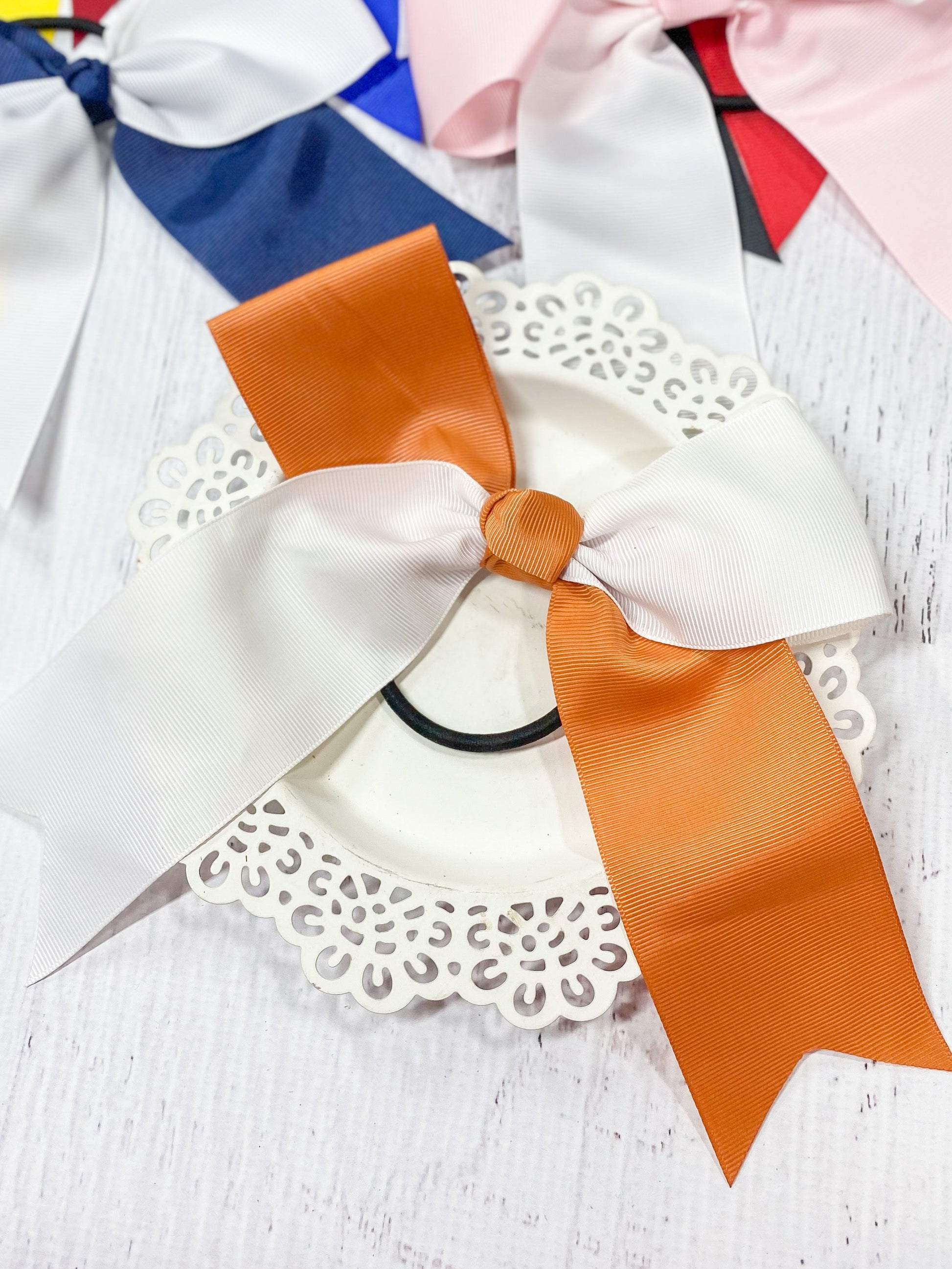 burnt orange and white school spirit cheer bow
