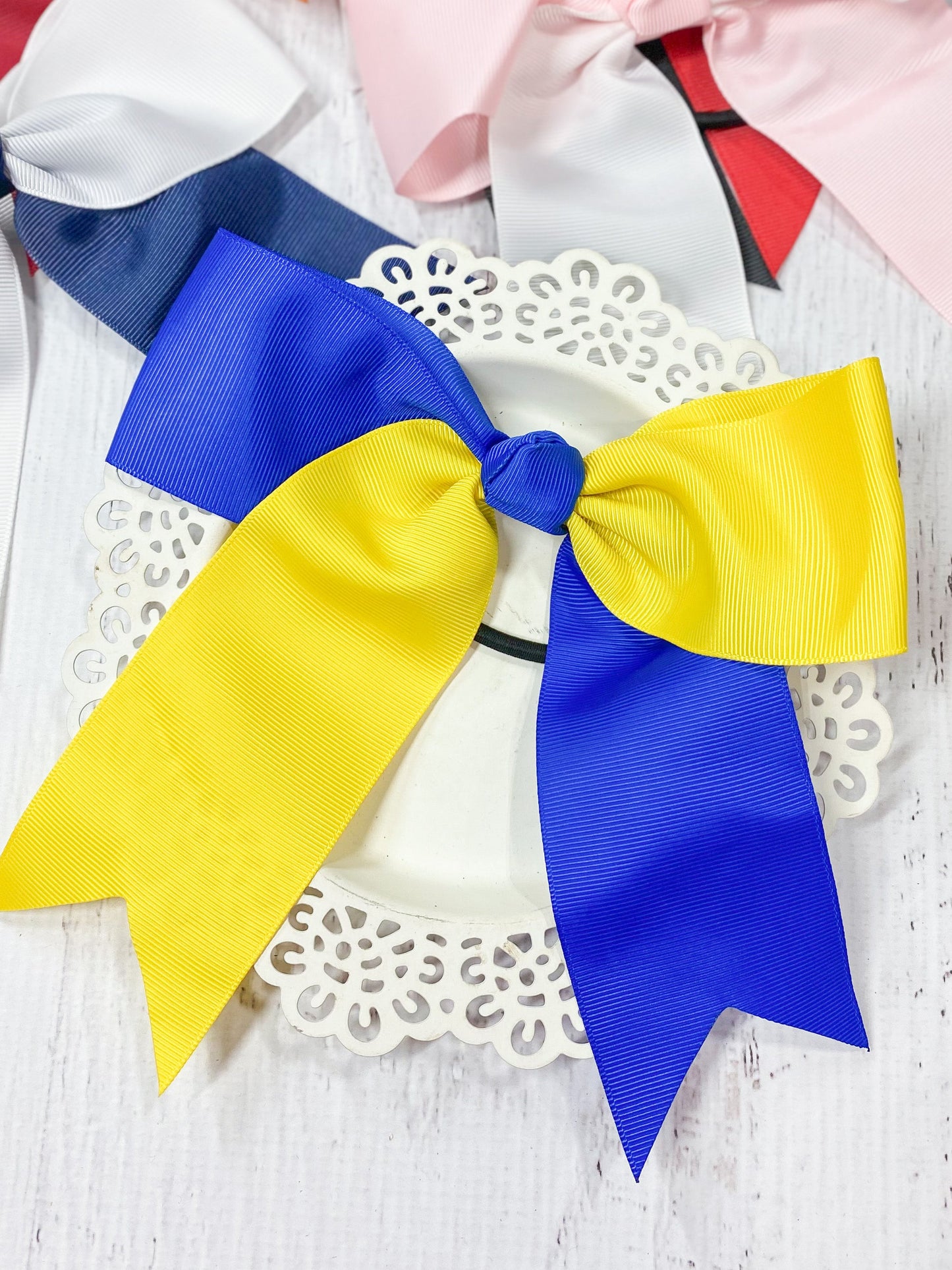 blue and yellow school spirit cheer bow