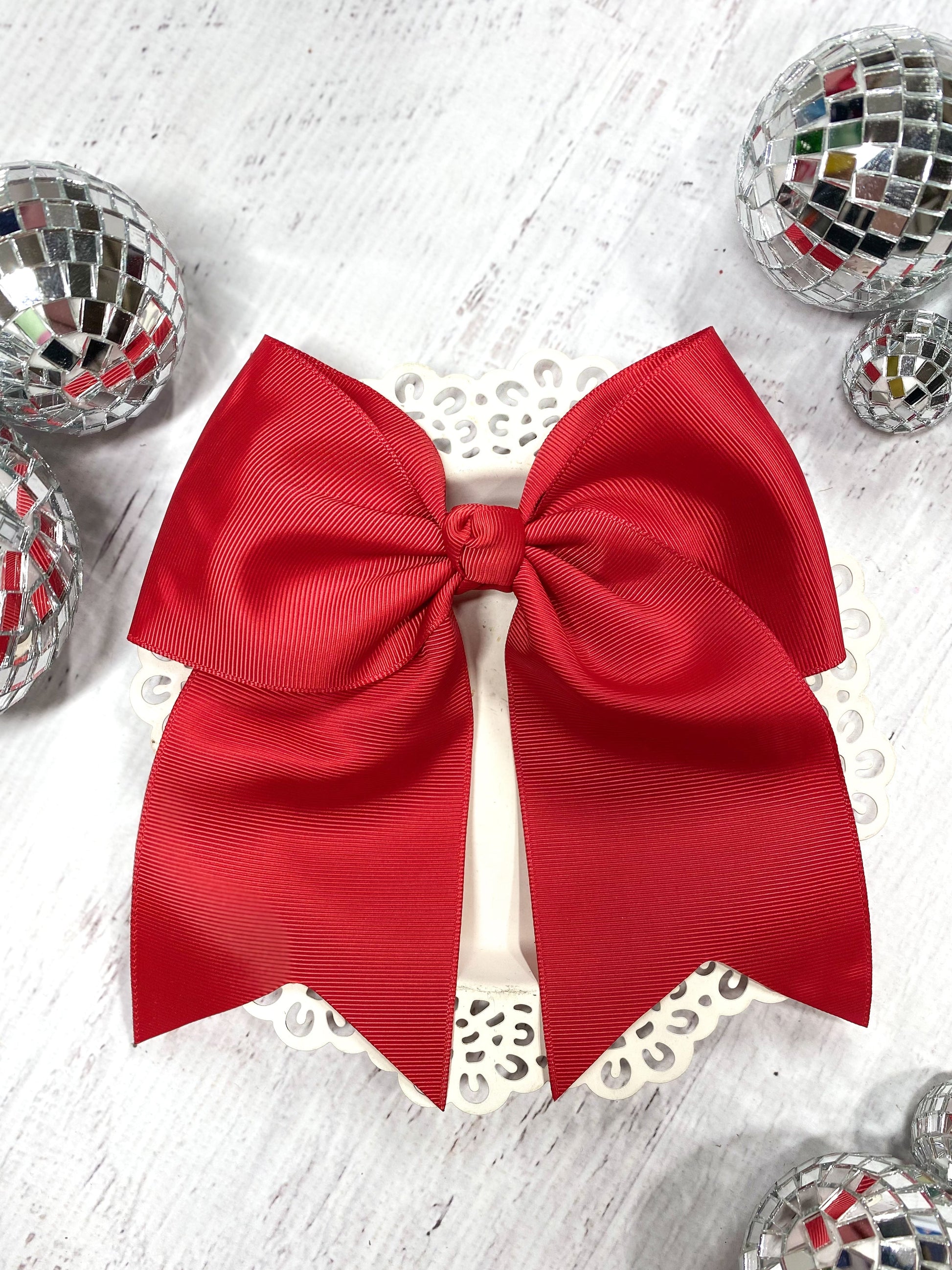 red solid cheer bow with pony-o clip