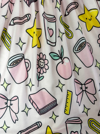 close up photo showing the pattern on the skirt of the dress