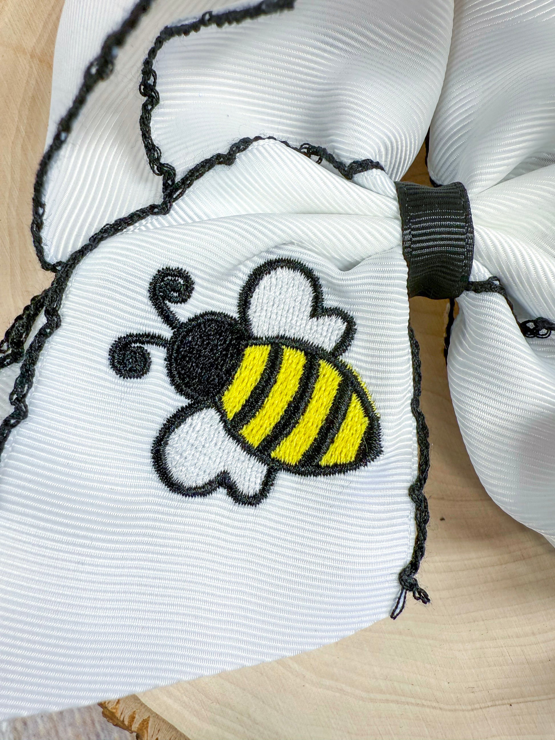 close up of bumblebee embroidery