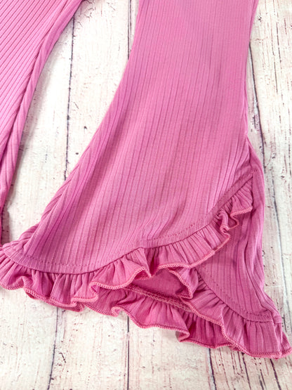 close up of the flared pant leg with ruffles