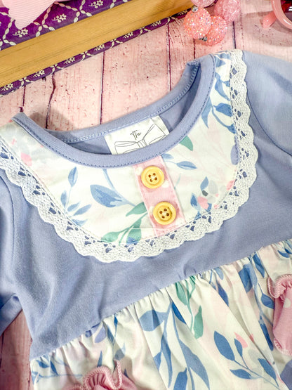 close up of the apron stitching on front of romper