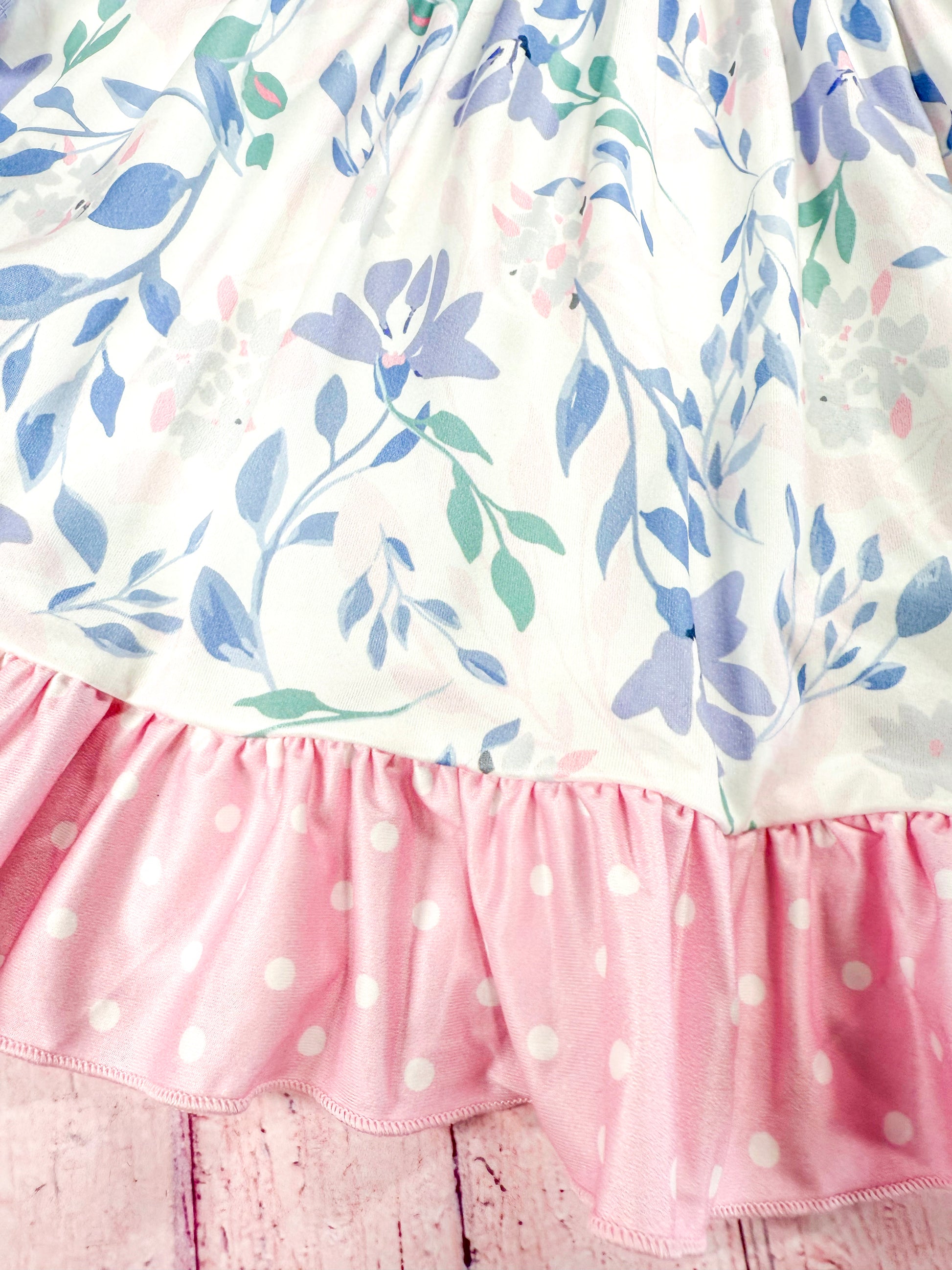 close up of the floral patterns on tiered skirt