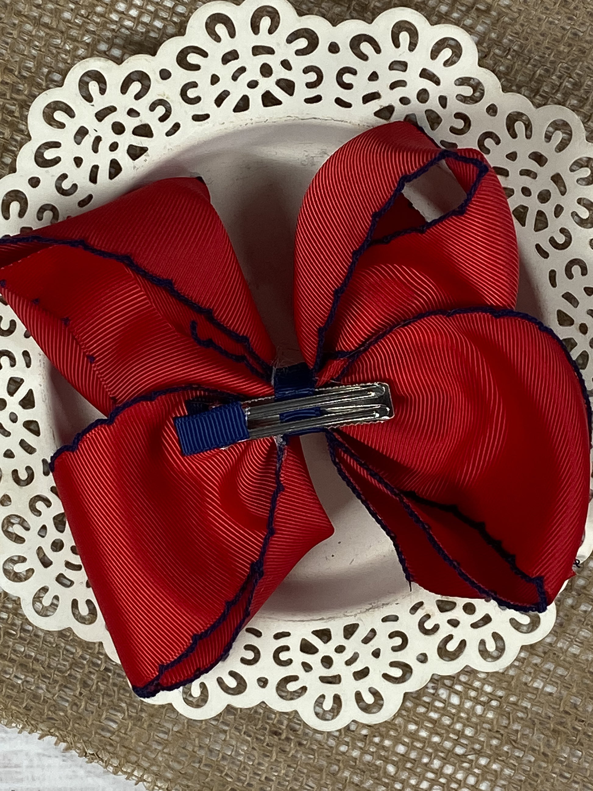 Back of the Red with Navy Moonstitch Hair Bow