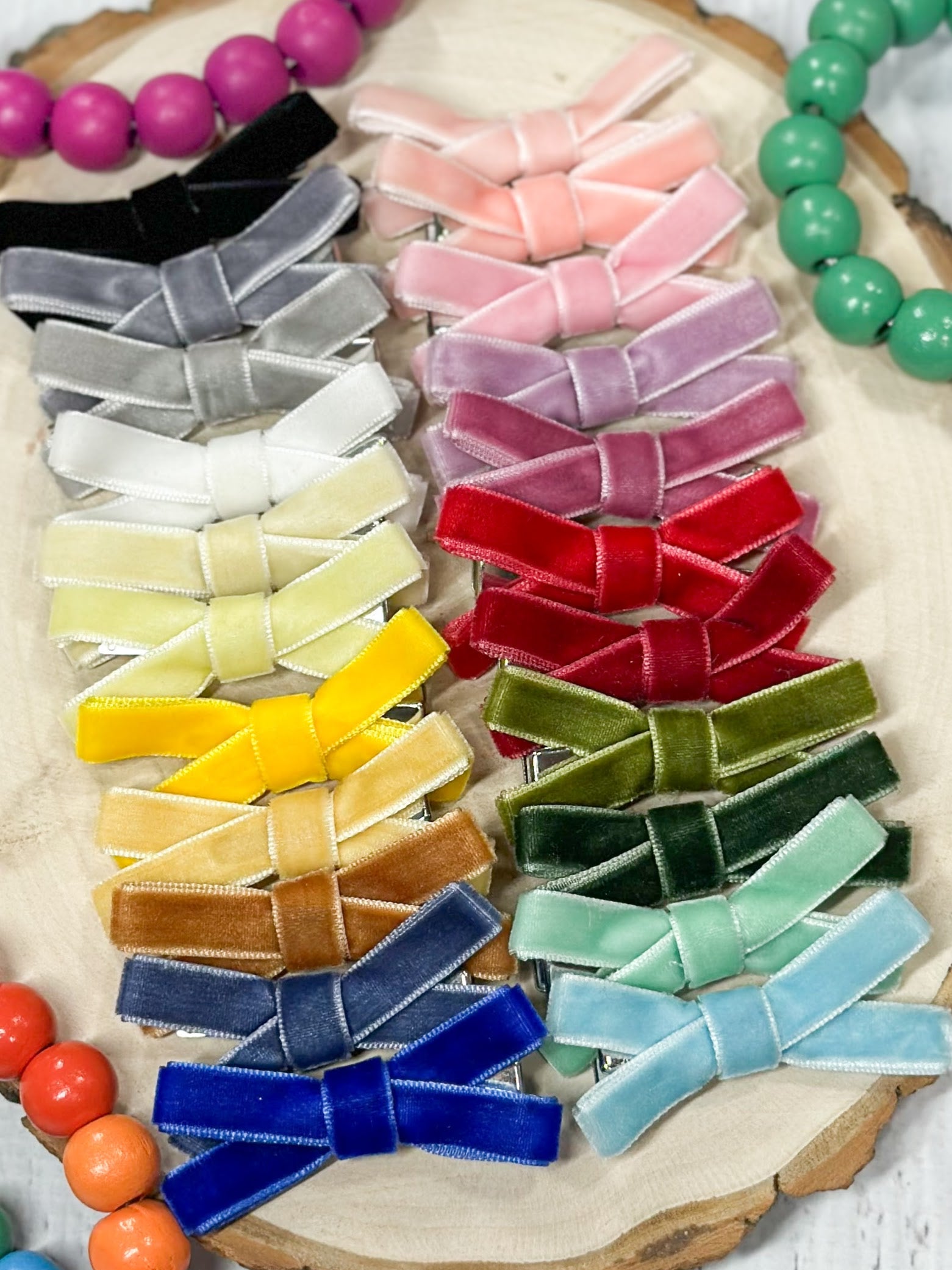 assortment of velvet bow clippies in multiple colors