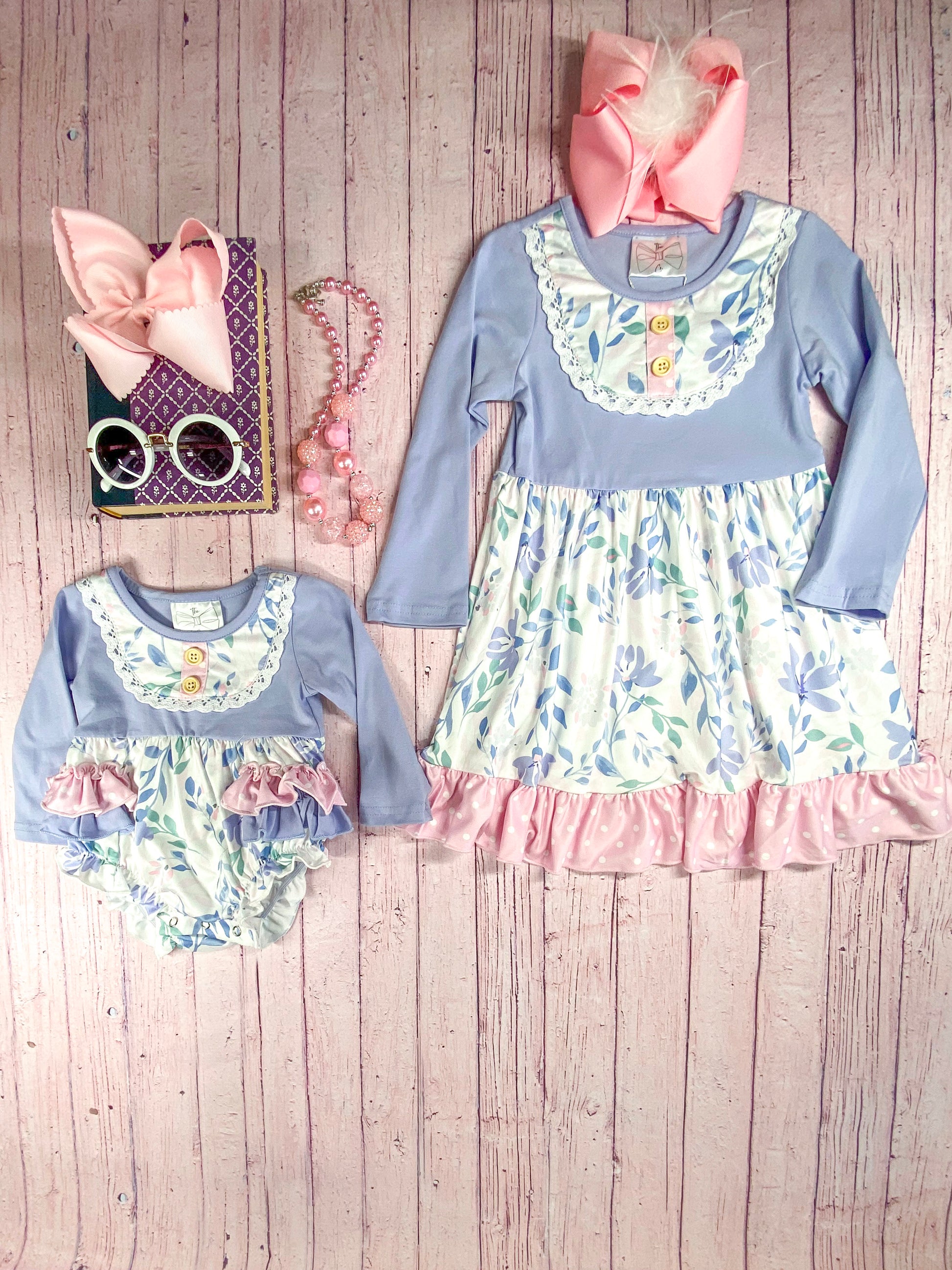 Purple & Pink Floral Tiered Dress next to matching infant onesie
