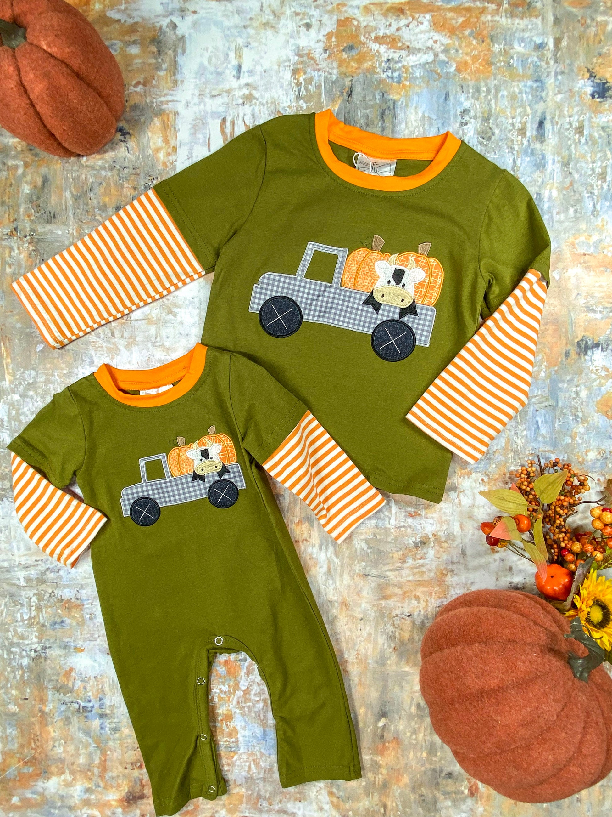 Haulin' Pumpkins Infant Boy's Romper next to matching boy's shirt
