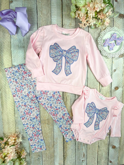 infant romper next to the matching girl's outfit