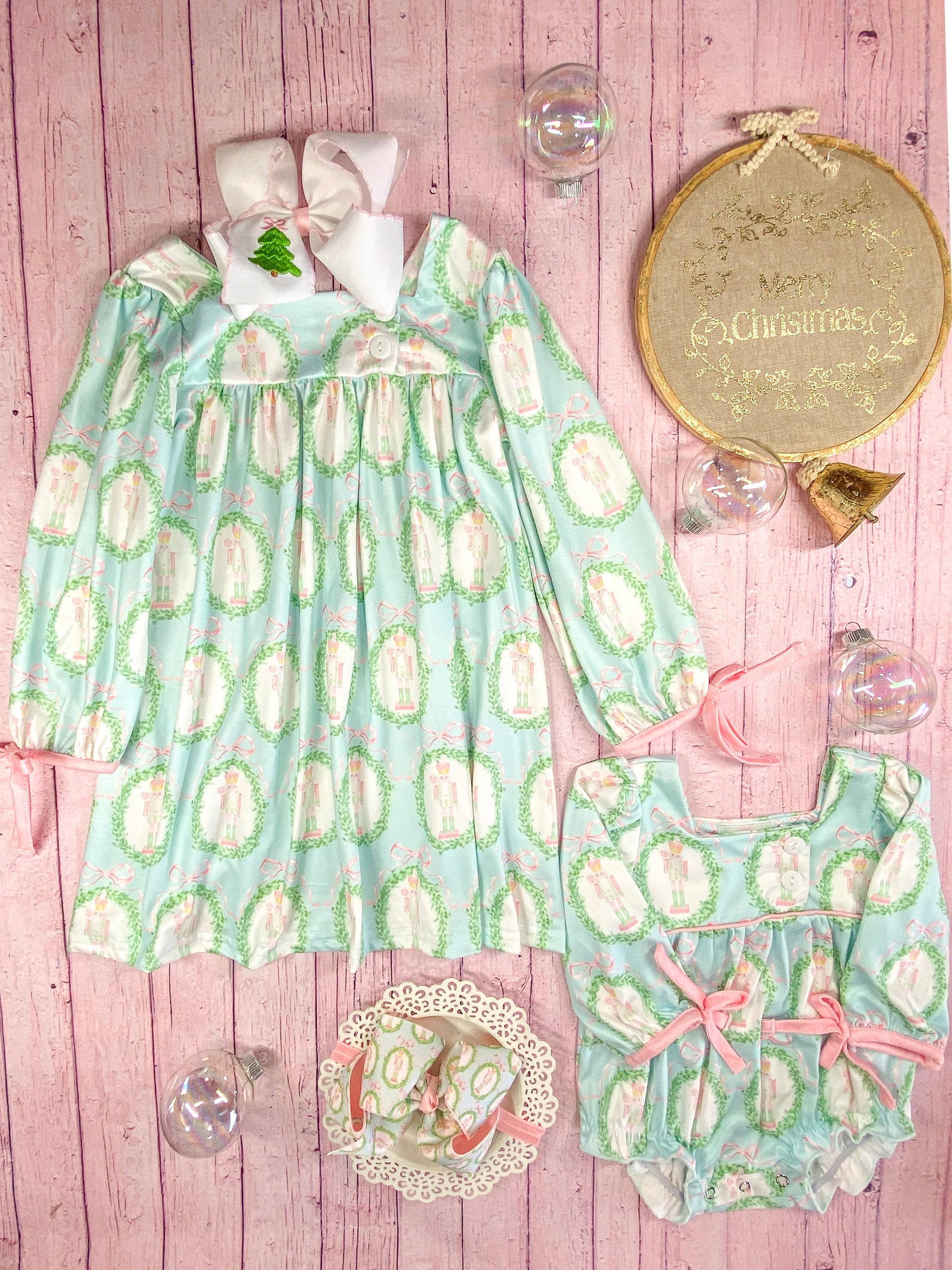 Nutcracker & Tied Sleeves Infant Romper next to matching girls dress