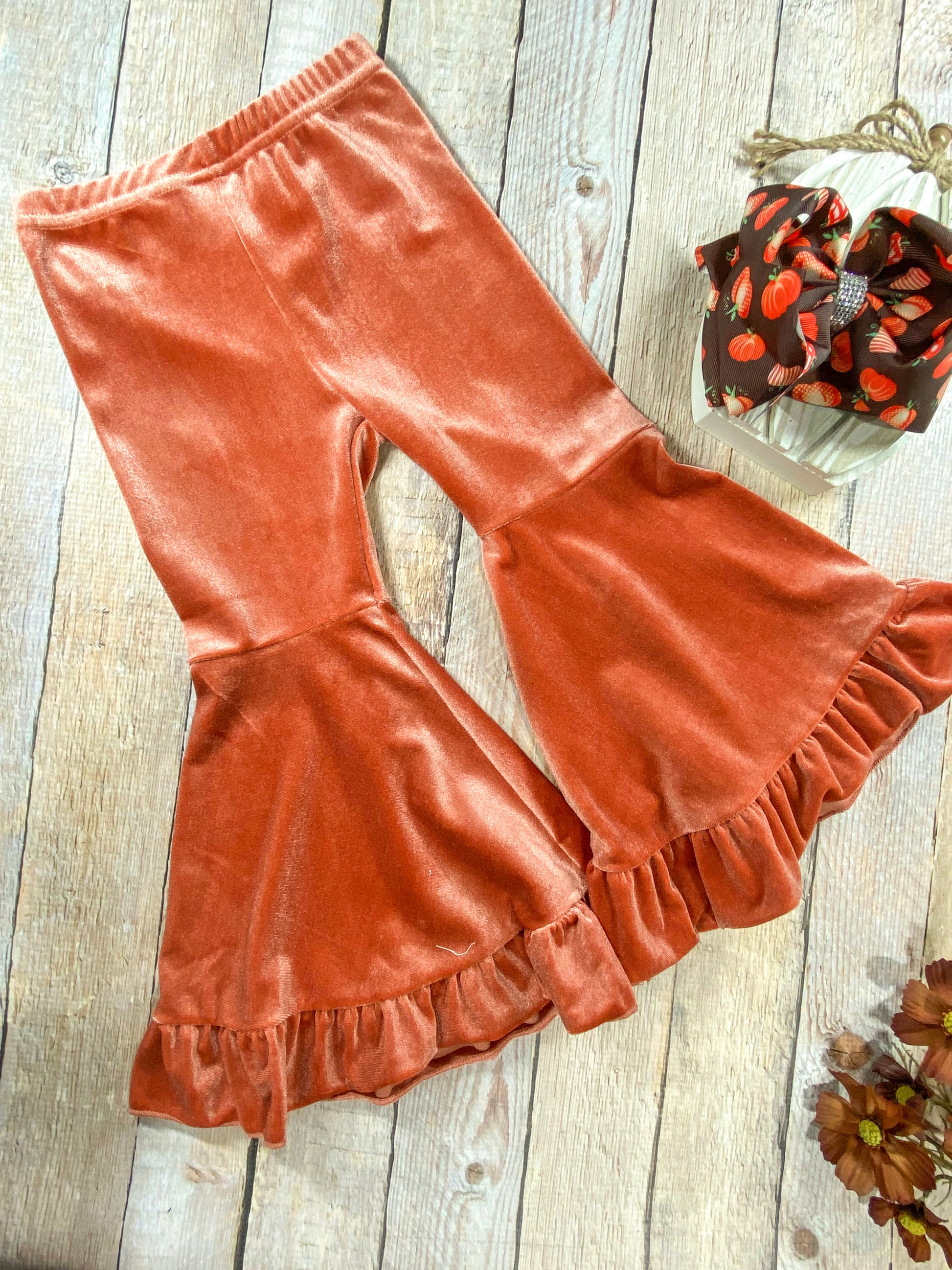 photo of the copper colored velvet bell bottoms