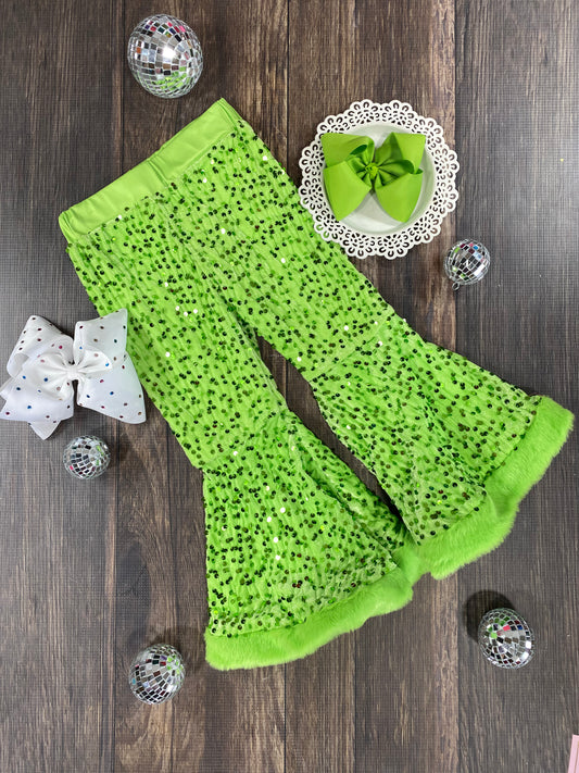 lime green sequin pants on wooden background - Alternative view