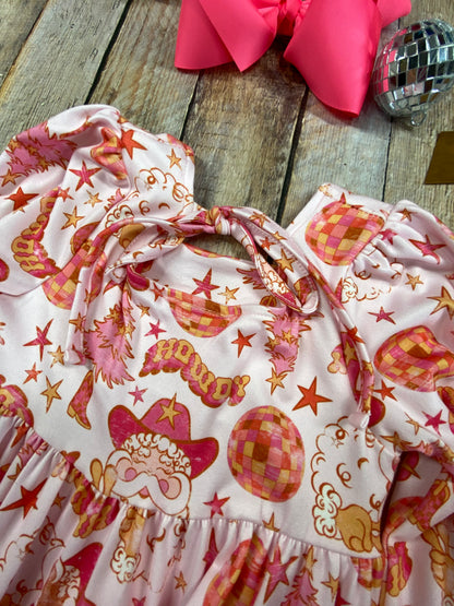 Back of Western Pink Santa twirl dress with retro holiday print