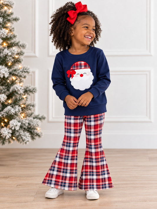 Navy Plaid Santa Girls Bell Bottom Set on model by a tree