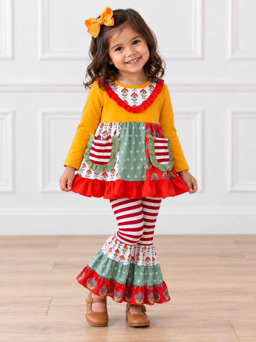 model wearing Patchwork tunic with mustard top and striped bell bottoms