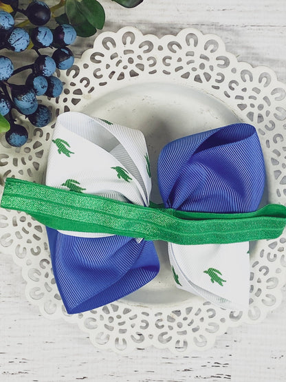 Back of alligator print bow headband showing satin elastic band