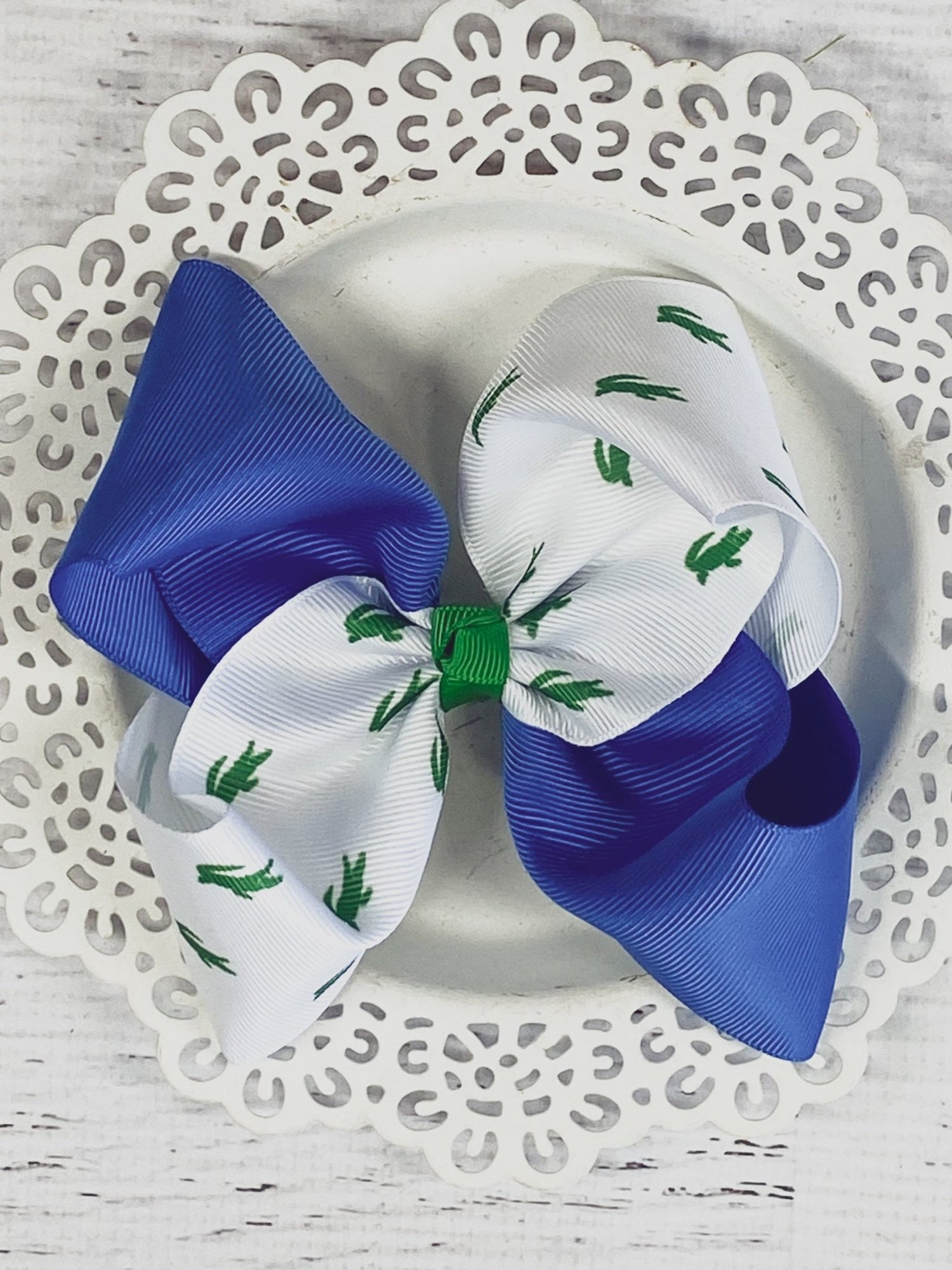 Alligator Print Hair Bow - blue, white and green alligator print on white lace plate