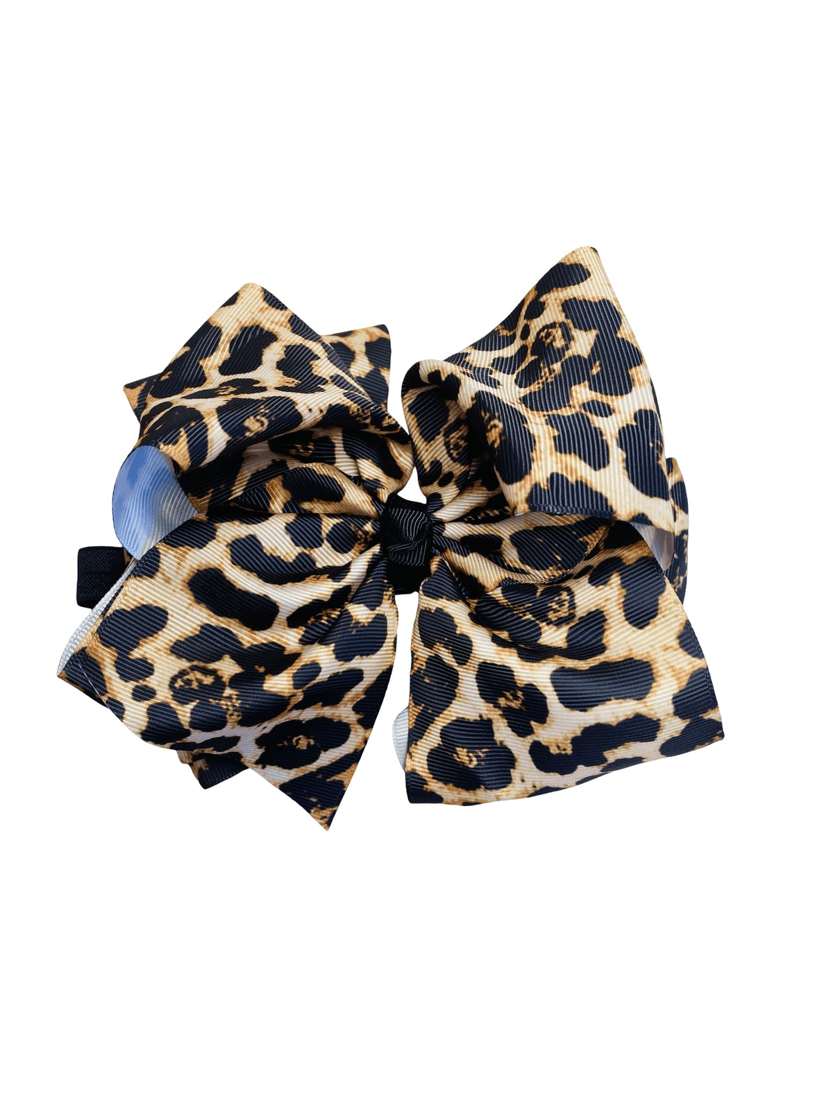 Leopard print hair bow on a white background