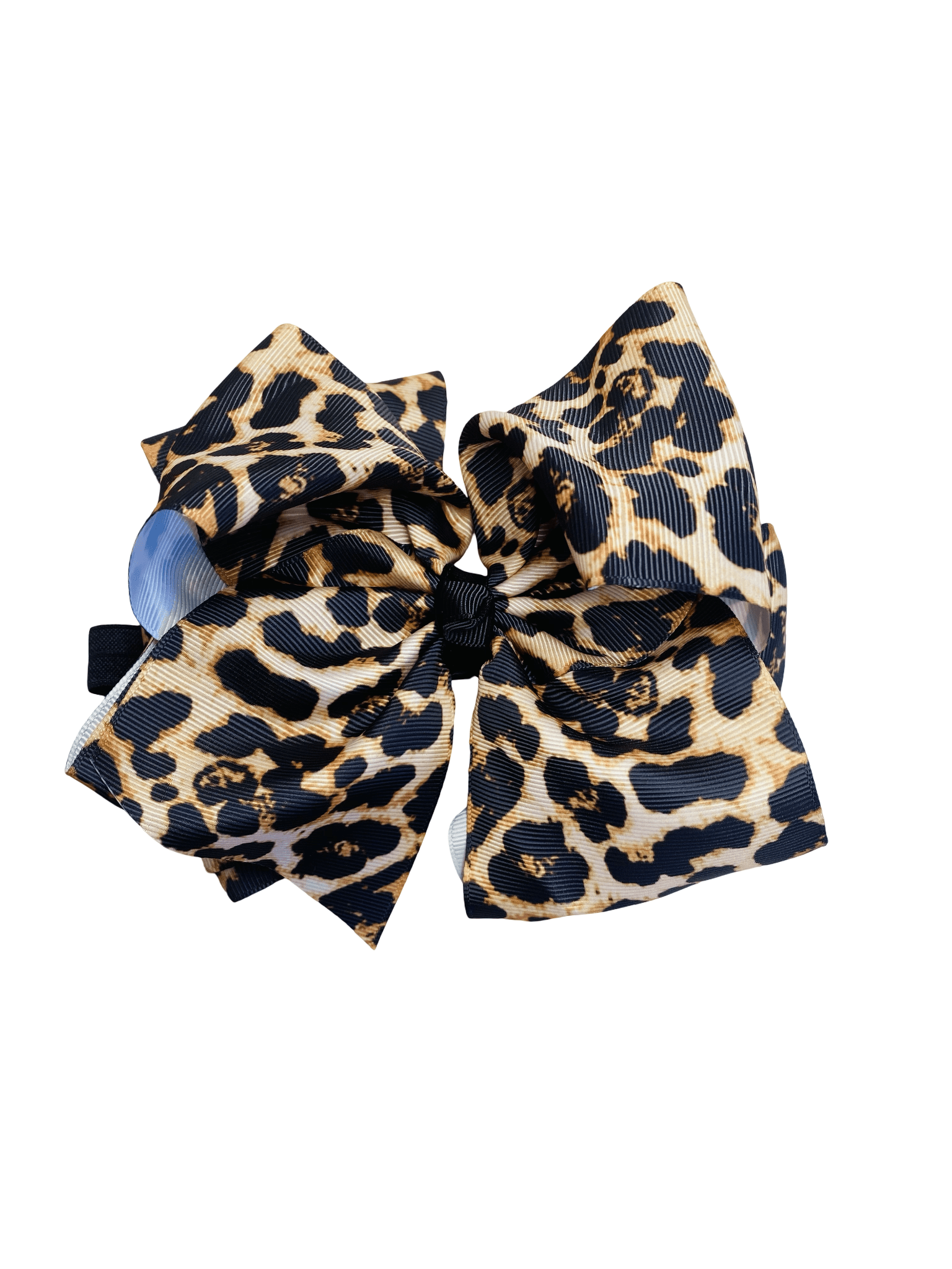 Leopard print hair bow on a white background