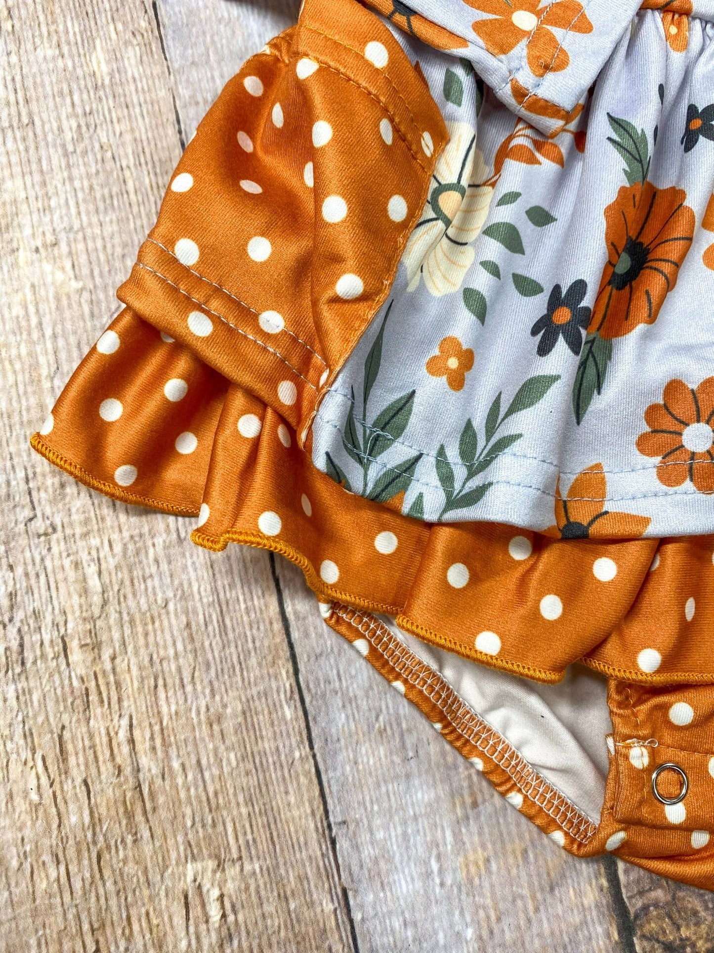 close up photo of the leg opening on romper