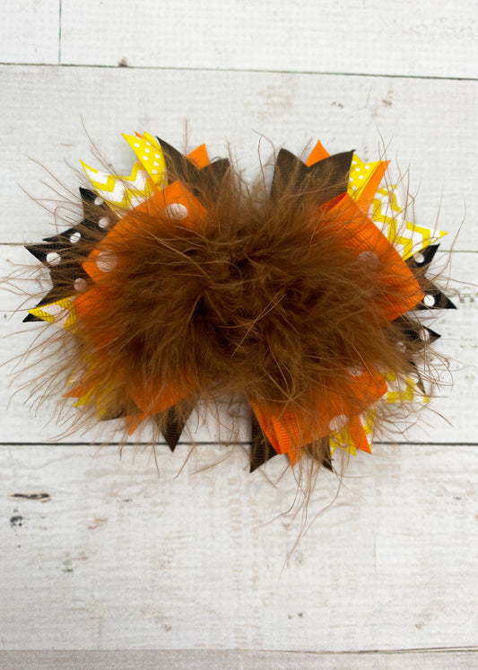 Autumn color layered marabou bow for girls with alligator clip backing.