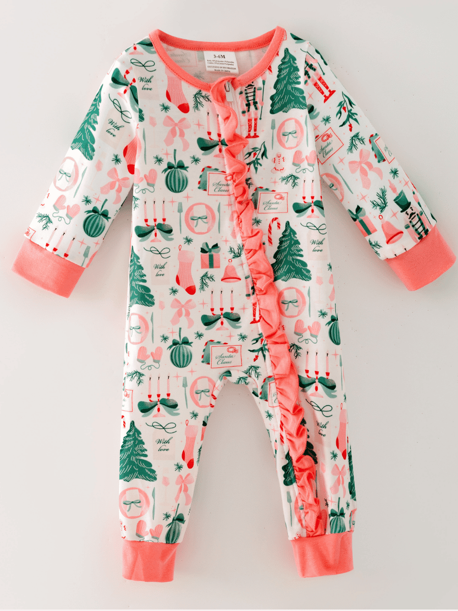 Baby Christmas romper with nutcrackers, trees, bows and coral ruffle trim