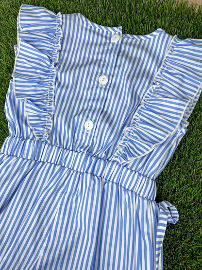 Blue and white striped romper with a  baseball on a grass background